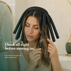 Woman wearing the full eight-arm headband setup at a vanity.