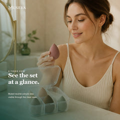 Woman viewing the sponge set in its open clear storage case.