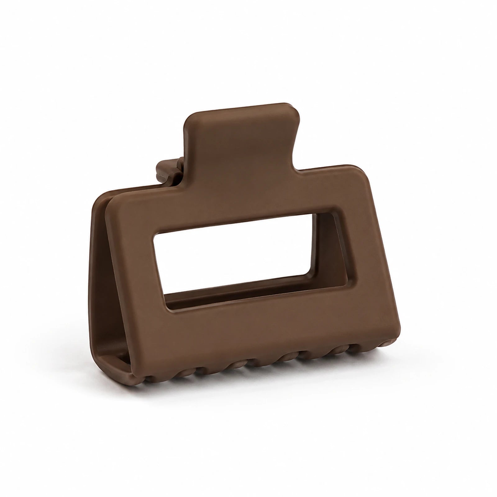The Matte Square Claw Clip on warm ivory with the headline A Cleaner Way to Clip Back.
