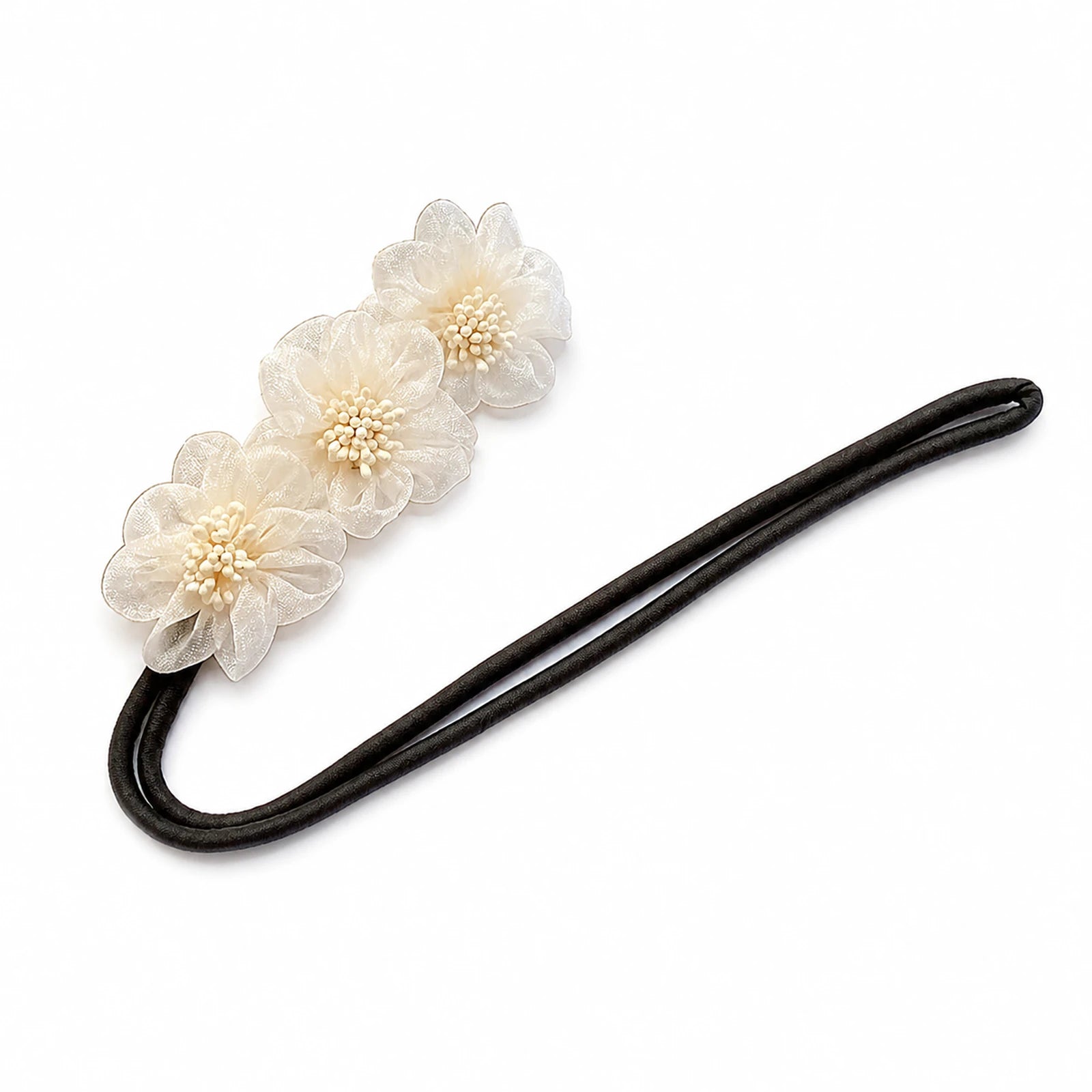 MUSEVA dark curved floral bun maker with three ivory flowers on warm ivory.
