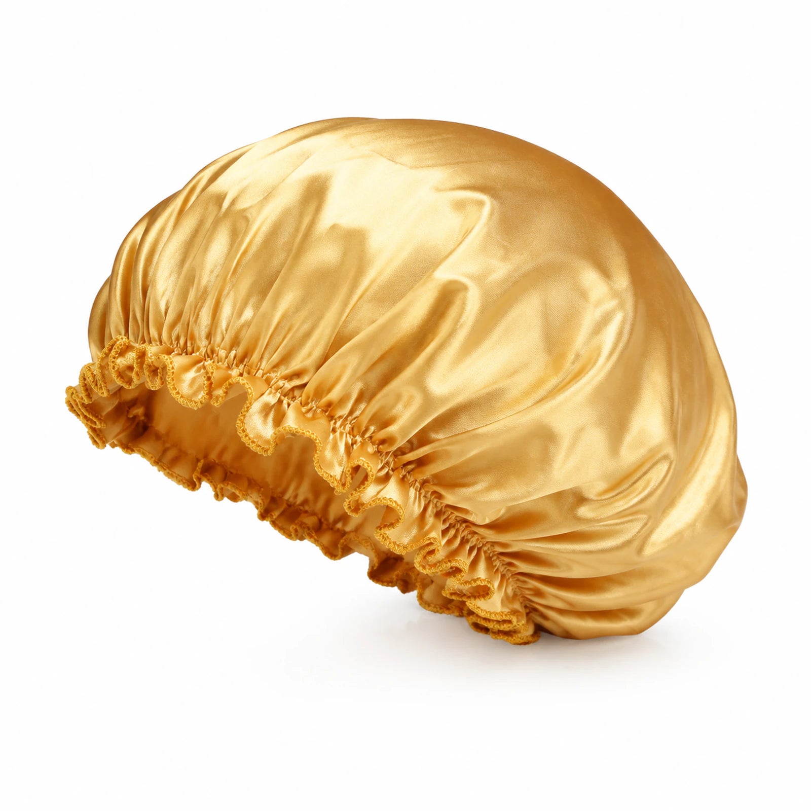 MUSEVA gold-tone gloss-look sleep bonnet on a warm ivory background.