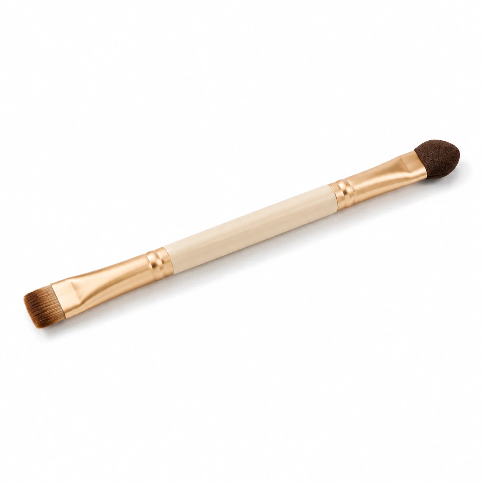 MUSEVA dual-ended eyeshadow and sponge brush on a warm ivory background.