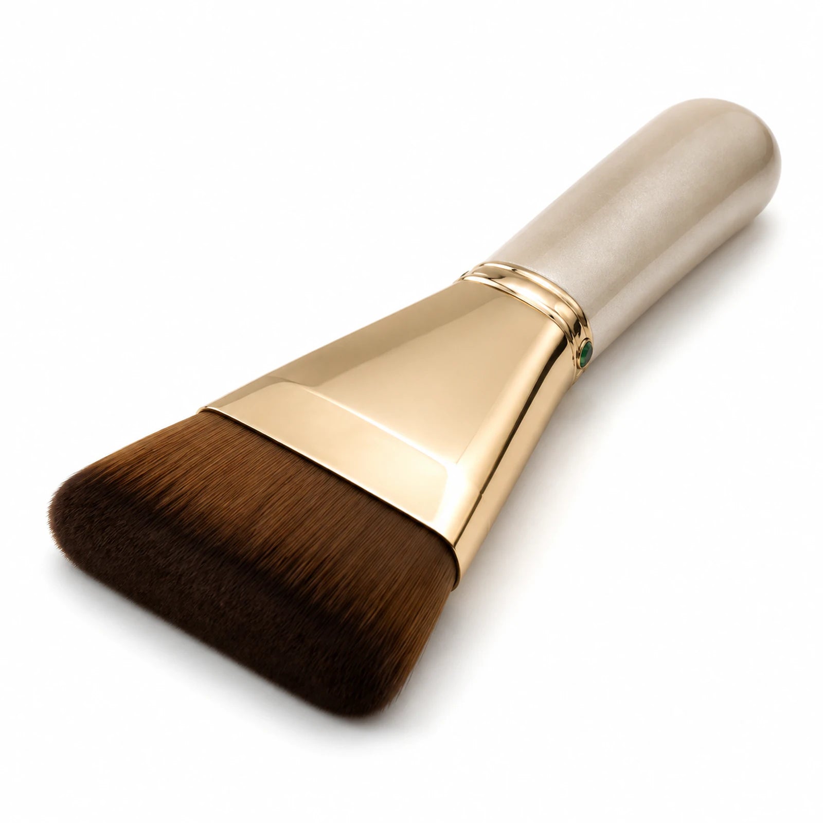 MUSEVA No.55 flat-wide foundation brush on a warm ivory background.