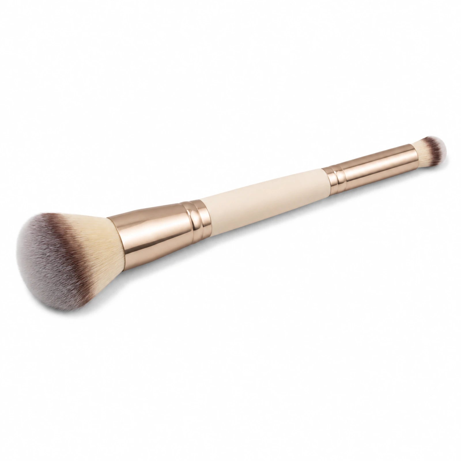 MUSEVA double-ended foundation and concealer brush on a warm ivory background.